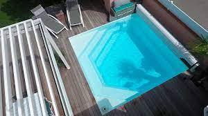 Piscine carré 4x4m avec volet de protection
